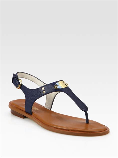 michael michael kors women's mk plate flat thong sandals|Michael Kors high heel sandals.